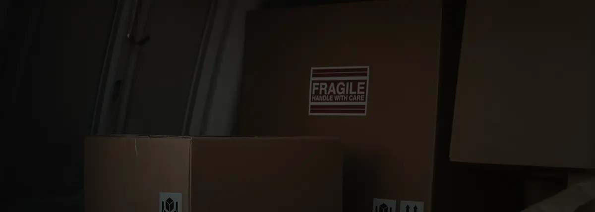 picture of boxes, one with a label marking it fragile